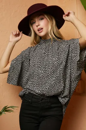 BLACK AND WHITE SHORT DOLMAN SLEEVE TIE BACK TOP